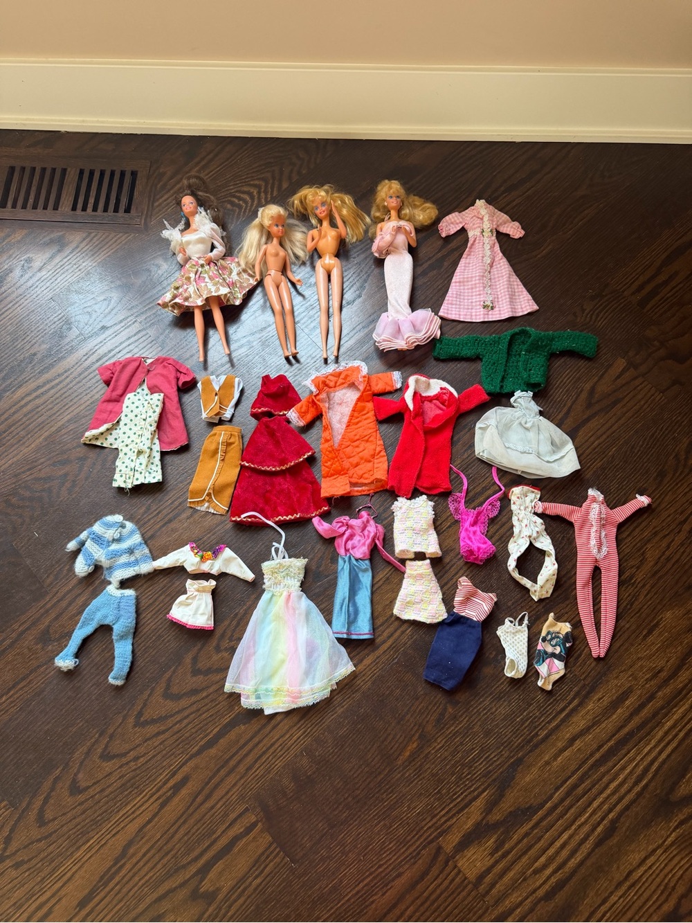 Lot of vintage Barbie clothes/ Barbies